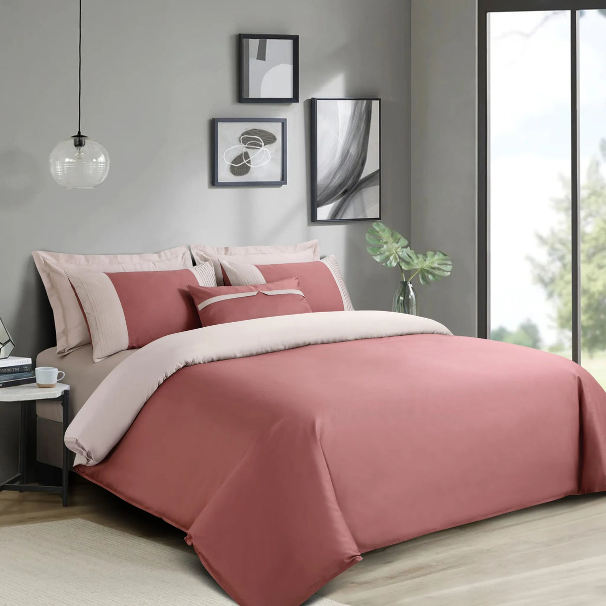 Bedroom with pink bedding and decor elements
