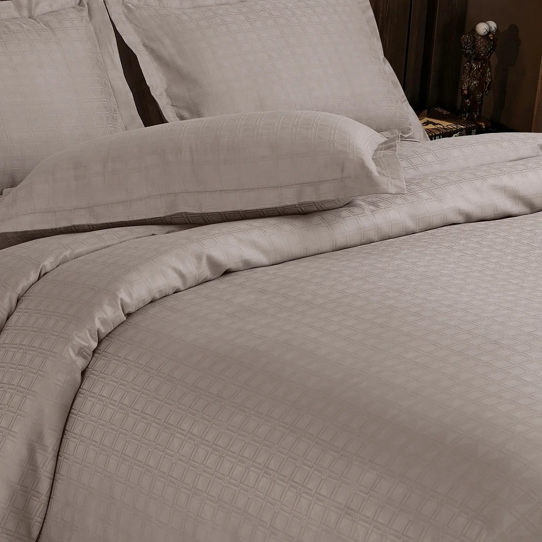 beige jacquard bed sheet